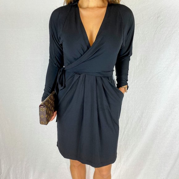 BCBGMaxAzria Dresses & Skirts - BCBGMAXAZRIA Black Faux Wrap Sleeved Dress